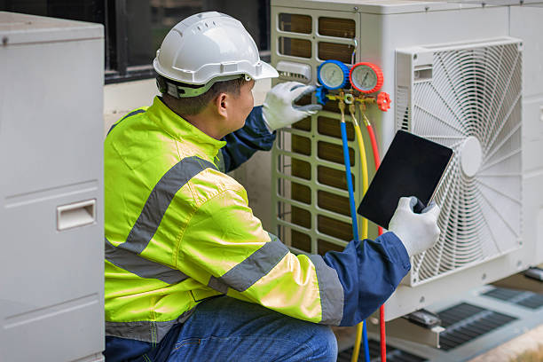 Professional Heat Pump Repair technician working in Ellsworth, KS